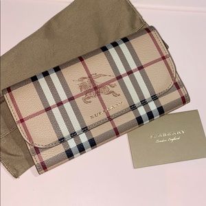 Burberry fold over wallet